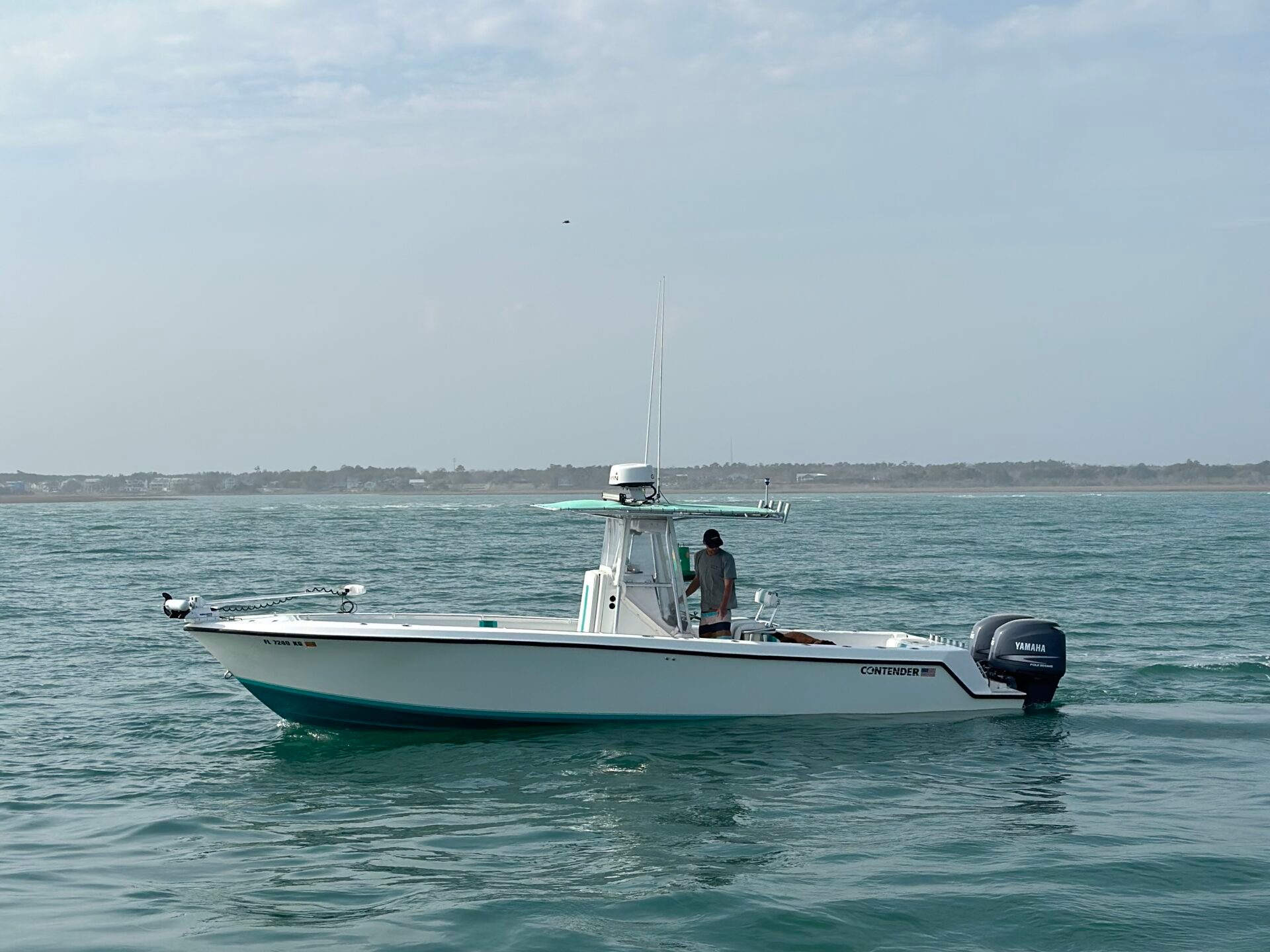 a small boat in a body of water